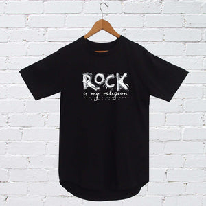 Rock Is My Religion with I'm With The Band® branding T-shirt with white print on black T on a coat hanger against a white painted brick wall